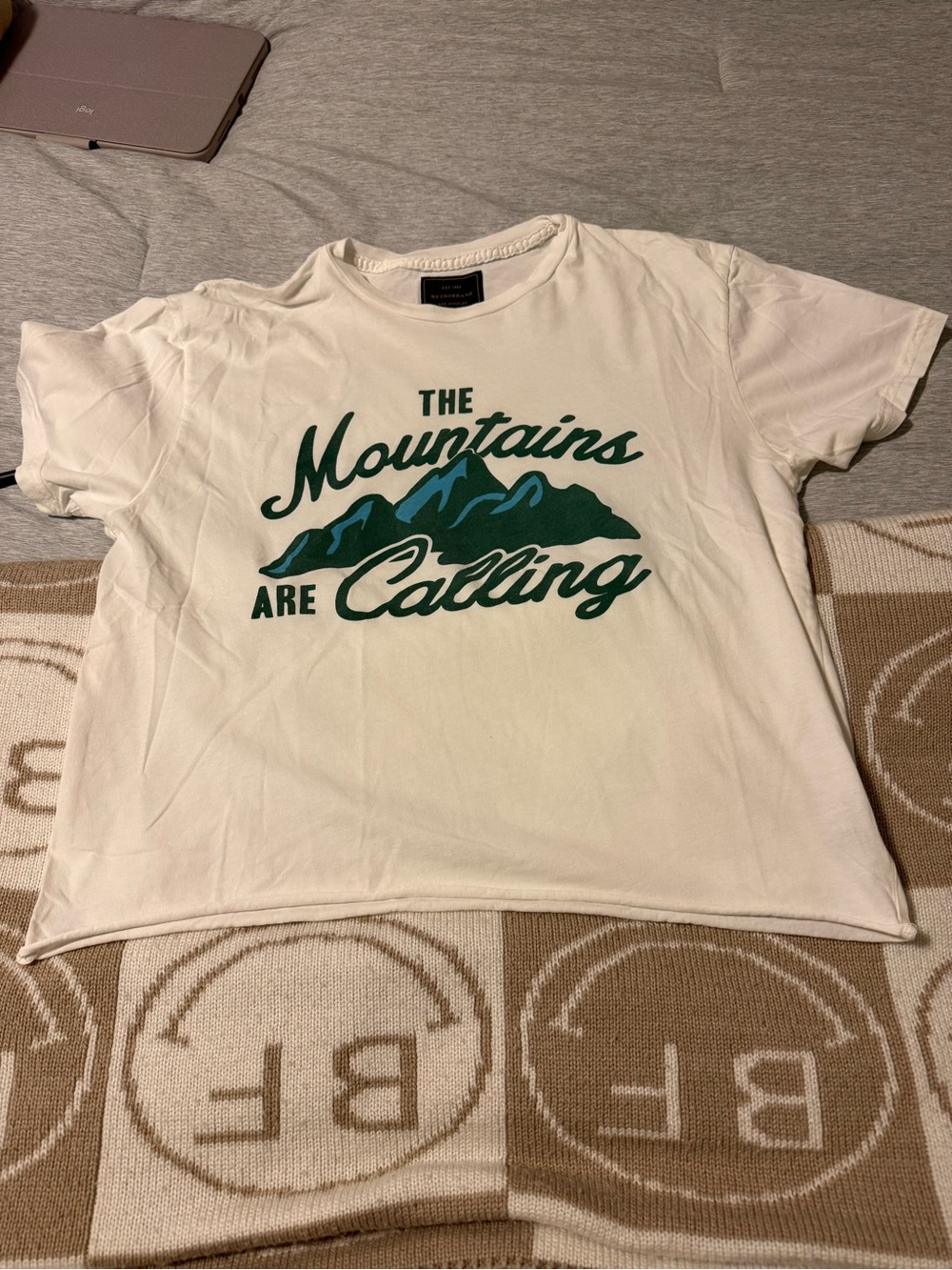 Original Retro Brand White Tee “THE MOUNTAINS ARE CALLING”